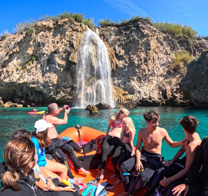 Nerja-Maro: Snorkeling & Sea Scooter Speedboat Trip - Snorkeling among fish, rocks, and clear water