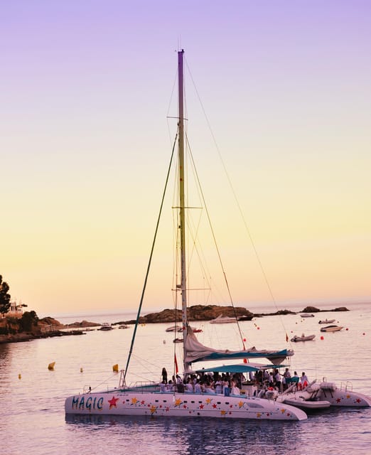 Palma de Mallorca: Sunset Sailing Catamaran Trip with Drink - Finding Magic Catamarans at Palma’s port