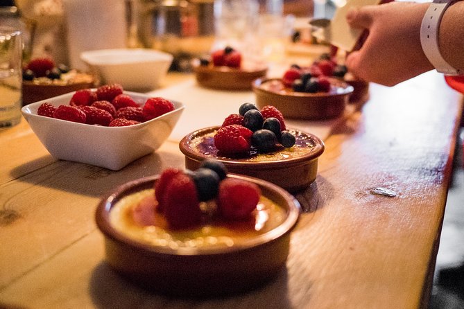 Premium Paella Cooking Class & 10 Spanish Tapas - The people make the class work