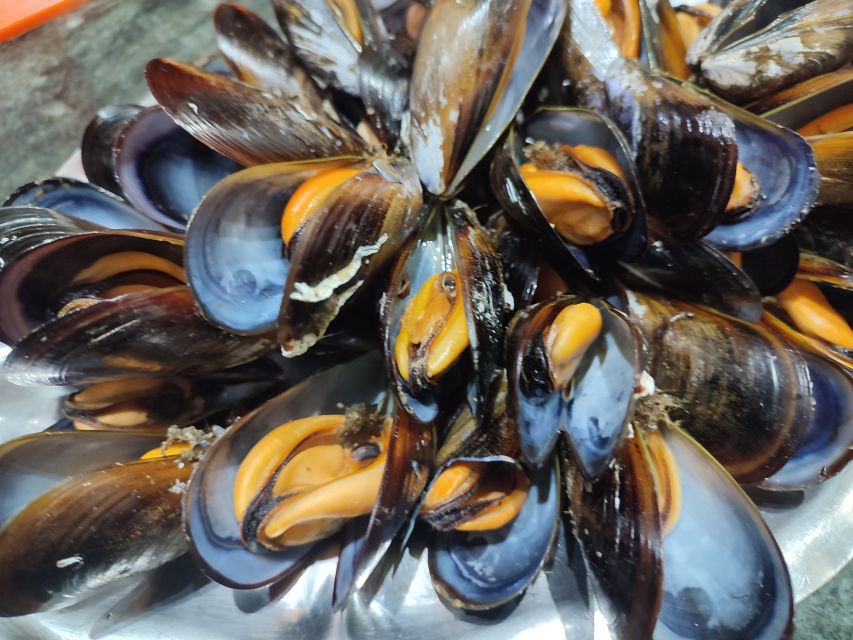 Ría de Arousa: Boat Ride to Mussel Farm with Tasting - Seeing the bateas and learning about shellfish farming