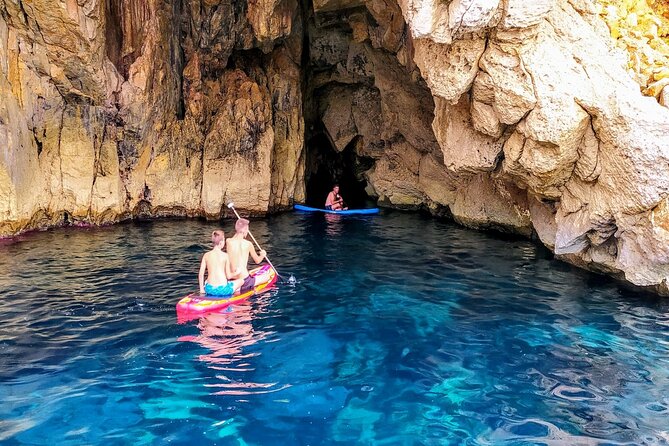 Sea Caves & Coves Snorkeling Paddle Boarding Tour - Drinks, fruit, music, and the social side