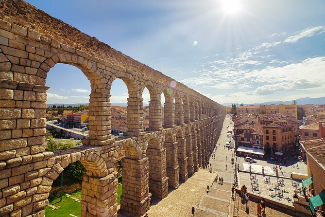 Segovia and Avila Guided Day Trip from Madrid - Guides, Audio Equipment, and Group Flow