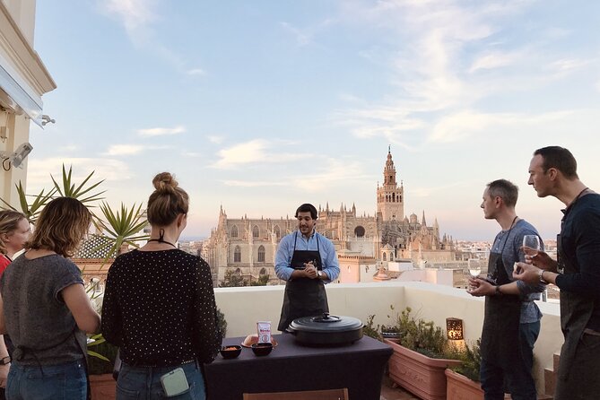 Sevilla: Rooftop Paella Cooking Class & 30-minute expert Q&A - Cooking the original chicken and vegetable paella