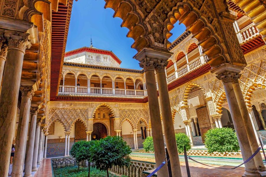 Seville: Alcázar Guided Palace Tour with Priority Access - The palace rooms: tiles, arches, and royal power