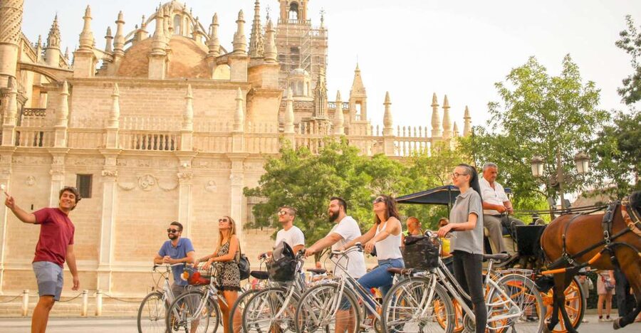 Seville: City Sightseeing and Local Culture Bike Tour - Triana and the Guadalquivir River