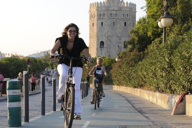 Seville Electric Bike Tour - Small Group - The Torre del Oro from across the river