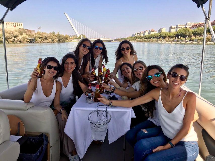 Seville: Exclusive River Boat Tour with Tapas - Comfort, weather, and the small-boat advantage