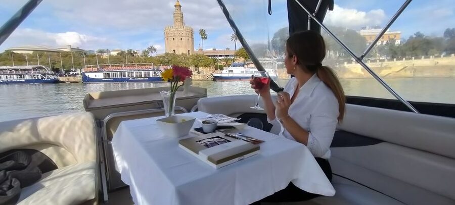 Seville: Exclusive River Boat Tour with Tapas - Why the captain matters more than the script