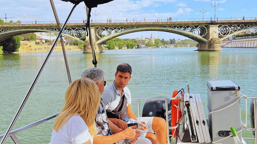 Seville: Guadalquivir River Boat Tour - Calle Betis, Triana Bridge, and the riverfront mood