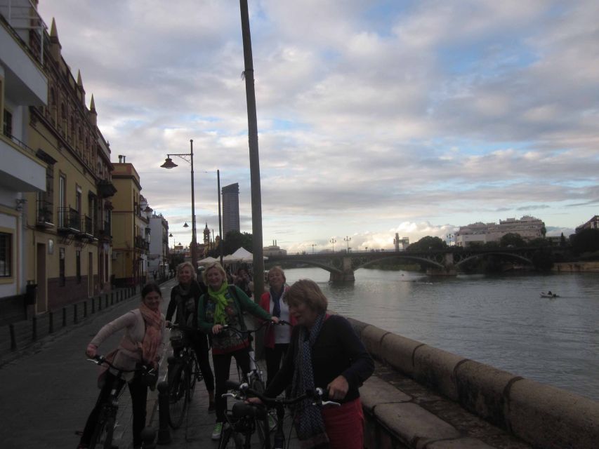Seville: Highlights City Bike Tour - Crossing into Triana’s pottery and flamenco quarter