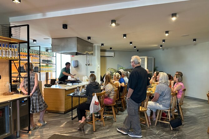 Seville: Paella Showcooking Experience - Local snacks, wine, and the first taste of Andalusia