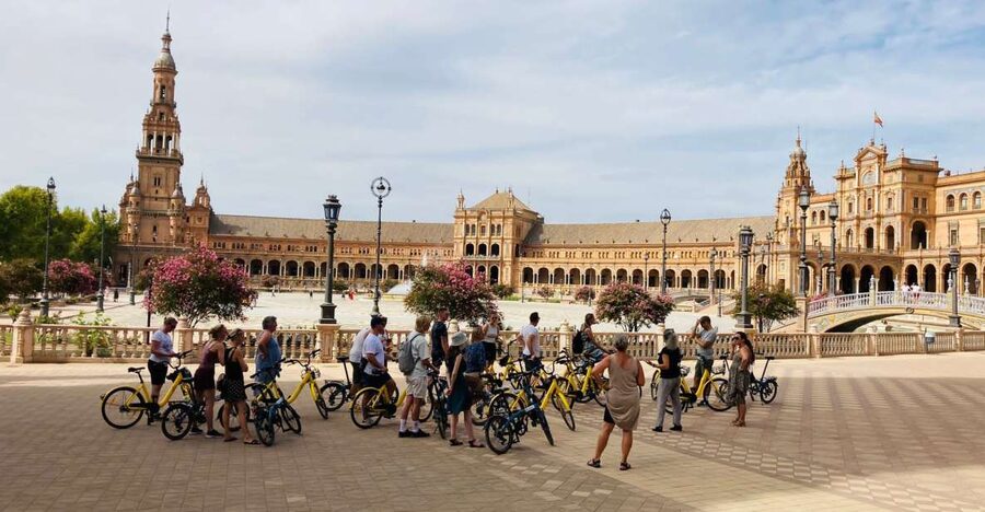 Seville: Relaxing City Bike Tour with a Tour Guide - Parque María Luisa and Plaza de España