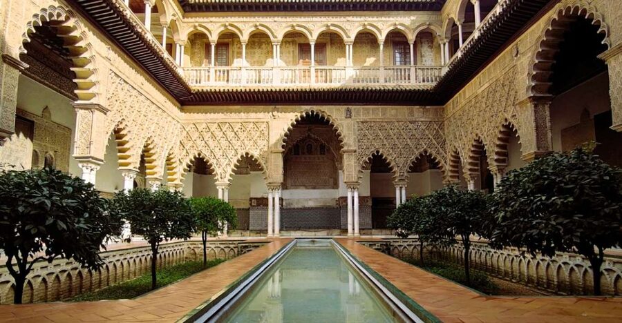 Seville: Small-Group Alcázar Guided Tour & Entry Ticket - Entering through the Justice Room and Palace of Plaster