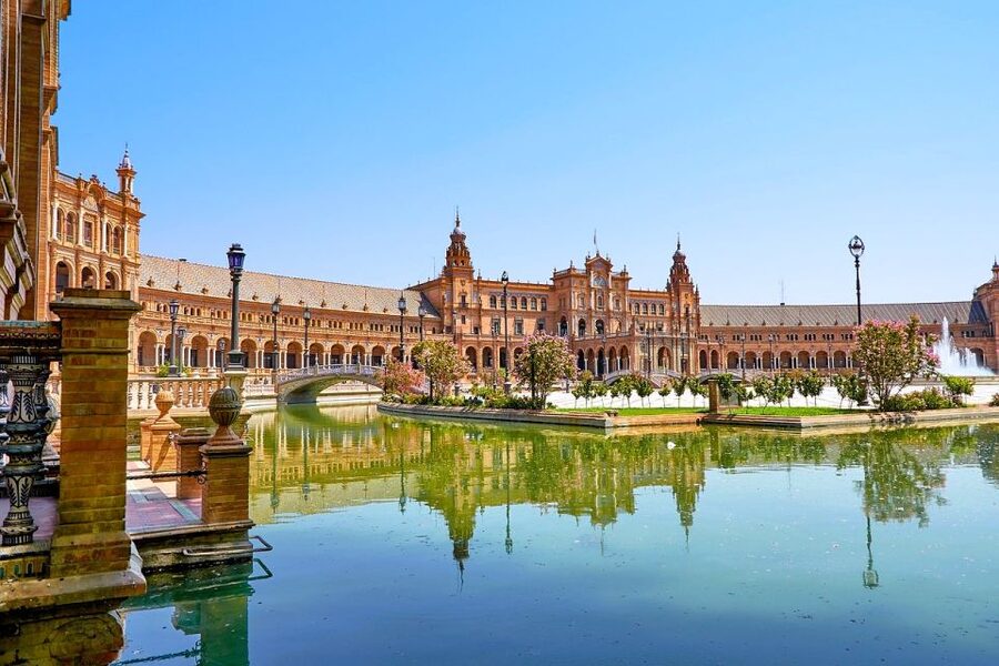 Seville: Small-Group City Highlights Walking Tour - Torre del Oro beside the river