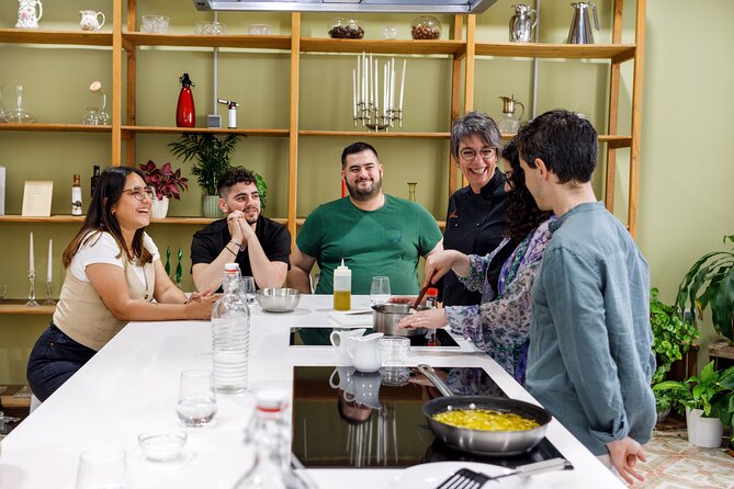 Tapas & Paella Cooking Class in Madrid with a Professional Chef - What happens inside the open kitchen