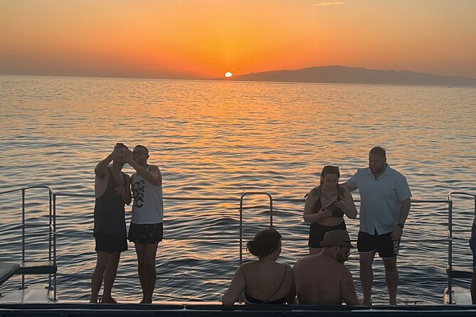 Tenerife Sunset Catamaran tour with transfer - Food and Drinks included. - The swimming stop adds a welcome change of pace