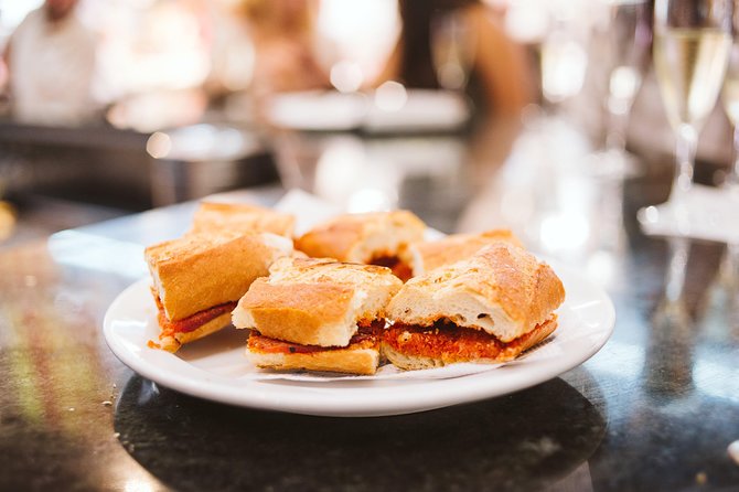 Ultimate Barcelona Food Tour with visit to a Local Market - Food, Drinks, and Dietary Limits