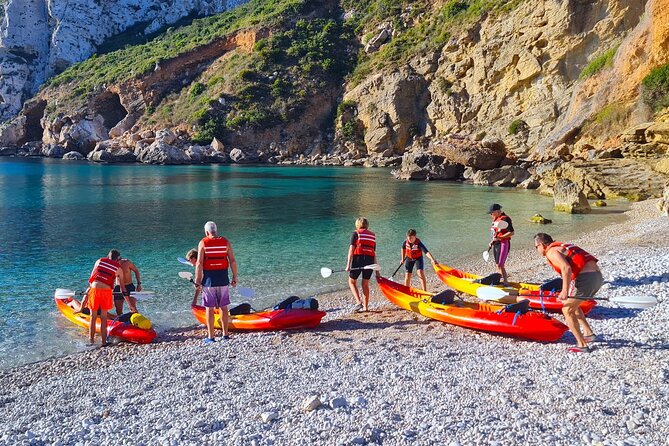 Uncharted Caves & Snorkelling Heaven: Cala Granadella Kayak Tour - Guides, group atmosphere, and safety
