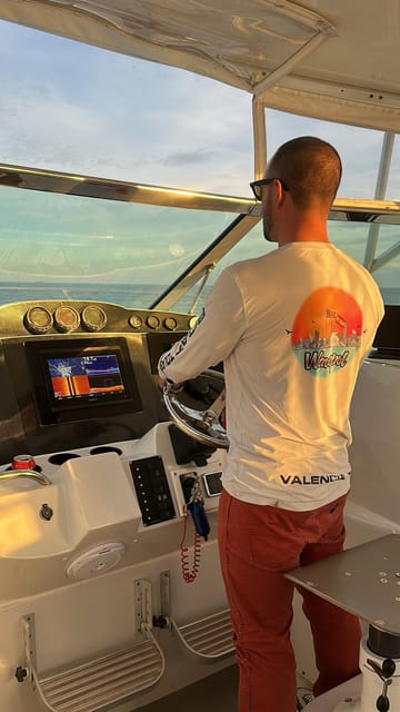 Valencia: Exclusive Sunset Cruise with Drink - Leaving Malvarrosa Beach for the open water