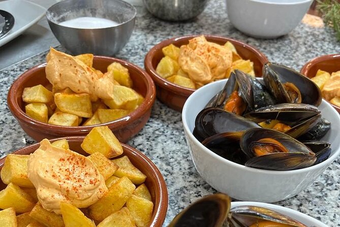 Valencian paella cooking class, tapas and visit to Ruzafa market. - What the $78.60 price includes