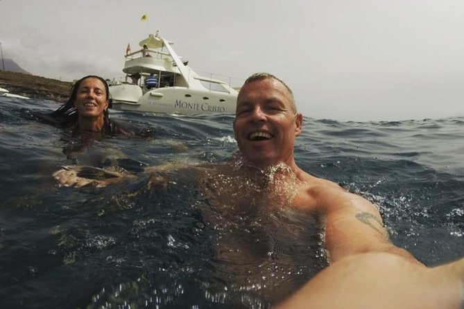 Whale Watching Catamaran Cruise with Transfer, Buffet by MC - Tapas, fruit, beer, and a simple buffet